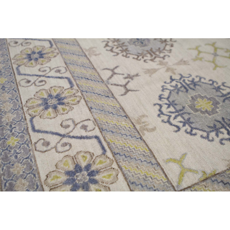 Tapis ivoire noué à la main de haute qualité
