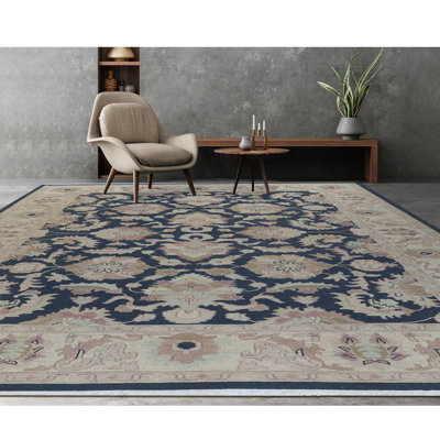 Tapis noir et doré de haute qualité noué à la main