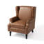 Fauteuil à oreilles en similicuir brun rembourré avec garniture cloutée Duward-374568035