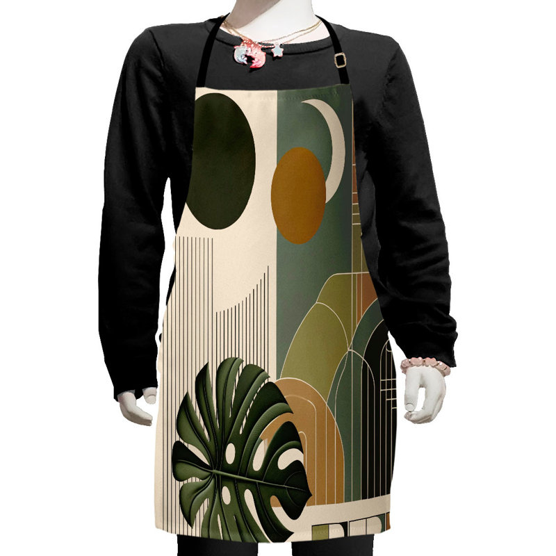 East Urban Home Monstera Apron with Adjustable Ties and Hook & Loop Straps Small Beige Evergreen and Sepia