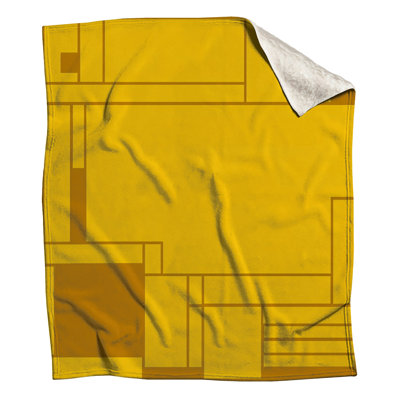 Couvertures jaunes à blocs géométriques