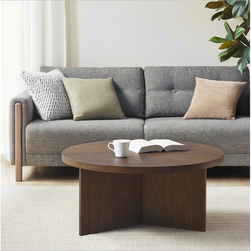 1 table basse ronde ci-dessous, Brun
