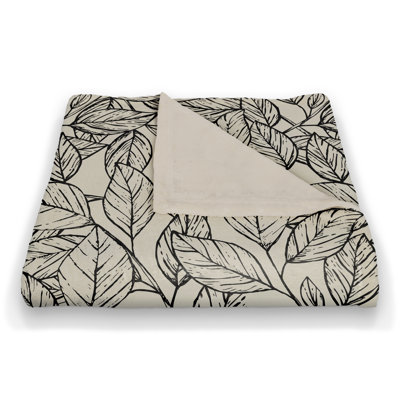 Jeté en molleton à feuilles esquissées