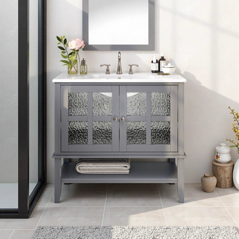 Meuble-lavabo gris 36 po avec lavabo en céramique, pieds en bois massif, tablettes réglables et ouvertes, charnières à fermeture en douceur et finition imperméable
