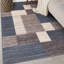 Tapis bleu touffeté à motif géométrique Allyne-1259850379
