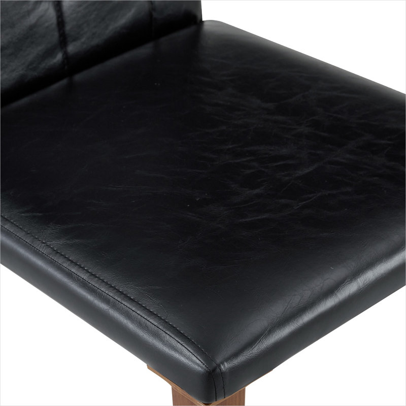 Chaises de salle à manger confortables en polyuréthane noir, pieds en métal, style moderne pour les repas en famille