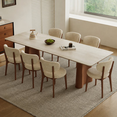 Table de salle à manger rectangulaire extra large de 220 cm (86,61 po) pour 8 à 10 personnes, avec dessus en pierre et piètement en frêne blanc.