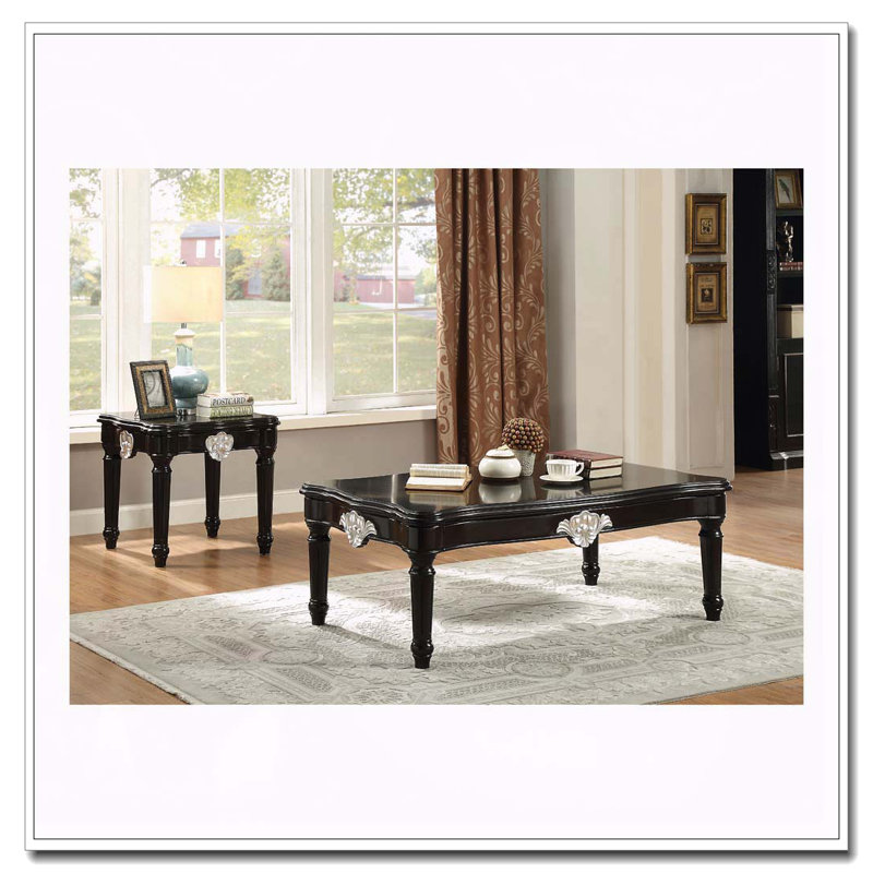 Table basse noire avec pieds tournés