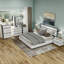 Carilla Wood 6-Piece Bedroom Set-87467145