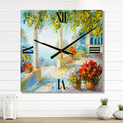 Horloge murale terrasse près de la mer avec fleurs