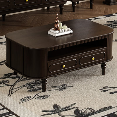 Elegant curvilinear coffee table with wooden feetA