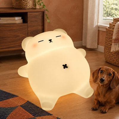 This rechargeable soft-silicone bear nursery lamp combines 3-Level Dimming, touch control, a 30-Minute Timer, soothing snore sound, and a moving tummy in a sleepy-bear design for kids' bedrooms.
