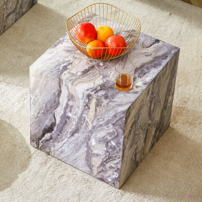 Rehaussez votre espace de vie avec cette table basse moderne en panneau de fibres à densité moyenne, qui met en valeur des motifs. Il est caractérisé par un design élégant.