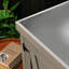 Banc de rempotage avec armoire de rangement et plateau de table en métal-111475313