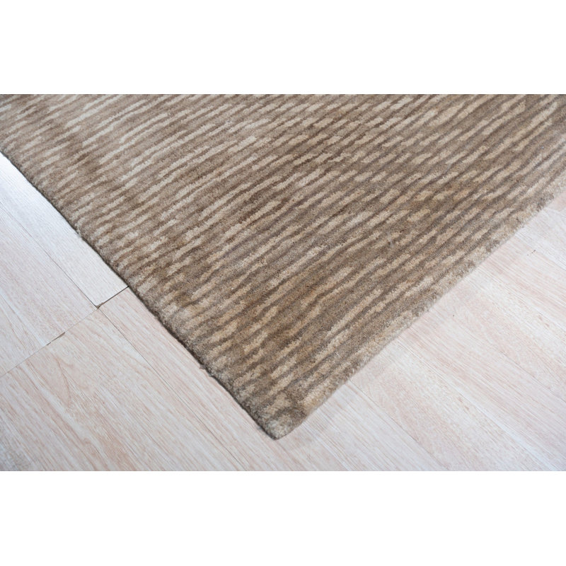 Hand Tufted Wool Area Rug in Brown