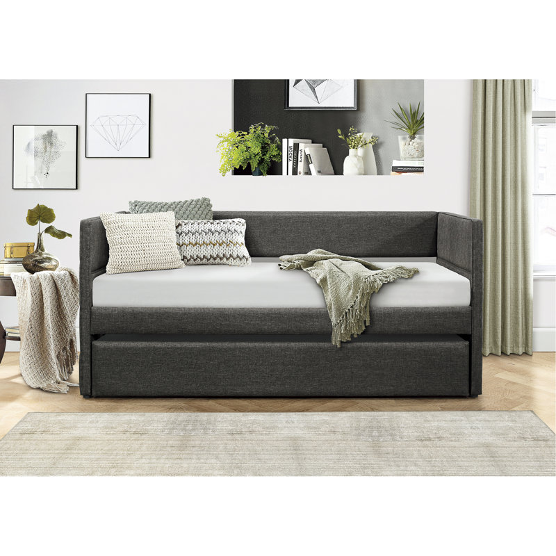 Lit de jour en tissu gris foncé avec couchette et structure en bois