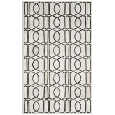 Tapis géométrique en cuir tissé à la main Sevastopol Studio