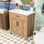 Meuble-lavabo autoportant avec tablette réglable, charnières à fermeture en douceur et lavabo en résine intégré