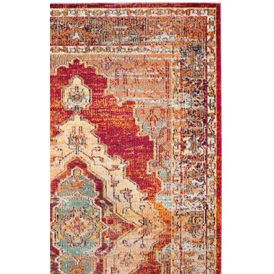 Donnella Orange Area Rug