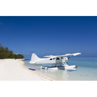 Seaplane By The Beach by Eriktrampe - Wrapped Canvas Print