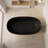 65 Inch Oval Black Freestanding Bathtub Solid Surface Matte Finish