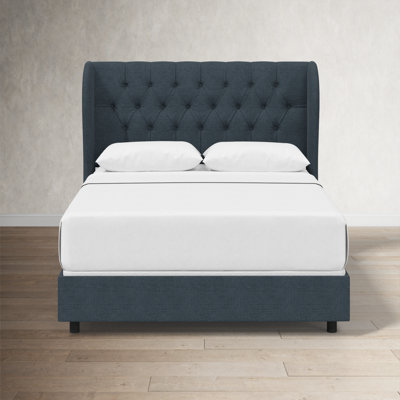 Tomey Upholstered Wingback Bed
