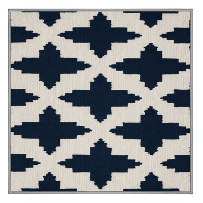 Tapis gris en treillis lavable à la machine