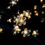 Arbre de Noël artificiel avec lumières en fleurs de cerisier-555561439-555561432
