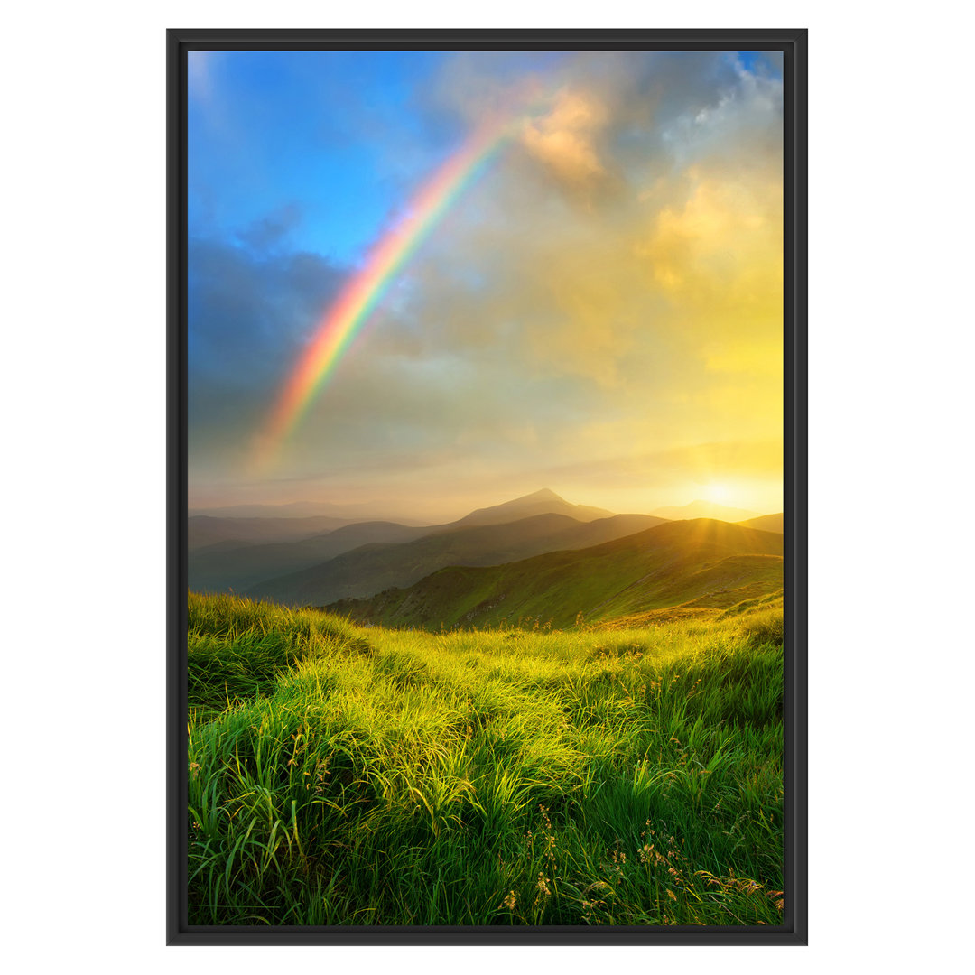 Gerahmtes Wandbild Berge mit Regenbogen am Himmel