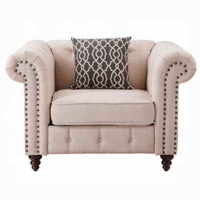 Fauteuil d'appoint capitonné beige avec coussin