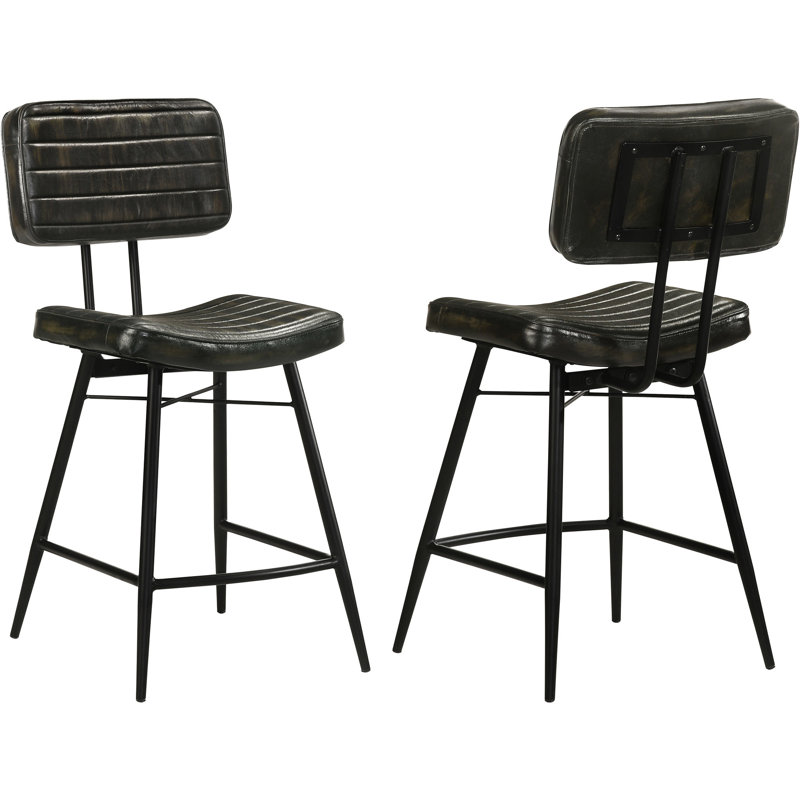 Chaise de bar antique, pieds en métal avec repose-pieds intégré, capitonnage horizontal, dossier plein, idéale pour une salle à manger. Composée de deux chaises rembourrées, elle offre un confort optimal grâce à sa base évasée.