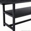 Une table de salle à manger de 71 x 35,4 pouces avec un plateau habilement assemblé par quatre panneaux de fibres à densité moyenne noirs texturés. Il y a une plateforme de rangement de 43,3 x 19,7 sous le bureau. Très approprié pour les réunions de famille-129390091