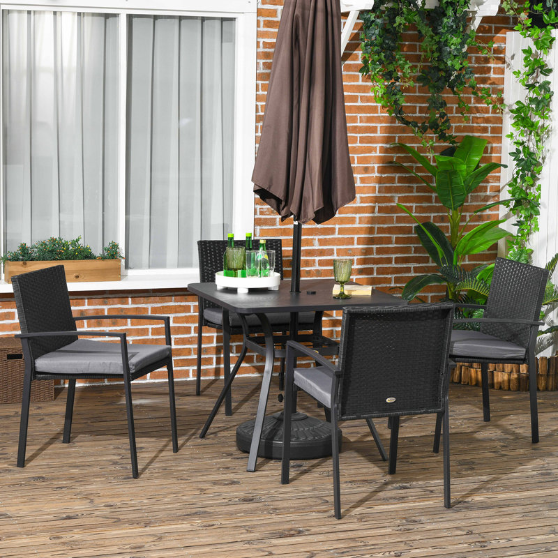 Nyobi 4 - Person Patio Dining Set with Square Table , Cushions Included