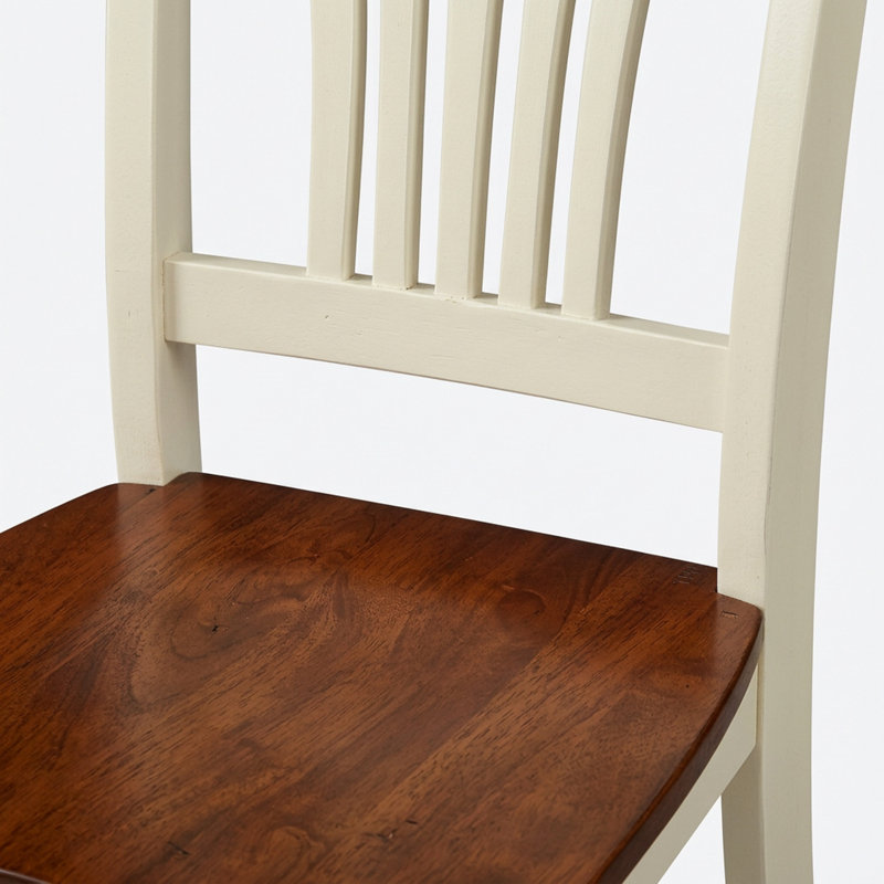 Ensemble de salle à manger 3 pièces en bois massif fini cerisier Butter Milk, avec deux rallonges rabattables de 23 cm et dossier à lattes.