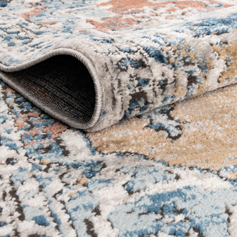 Tapis bleu / blanc / orange à motif abstrait Weingartner, Ovale 6 pi 1 po x 9 pi