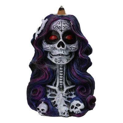 Brûleur d'encens à reflux Senorita pour la fête des morts, en forme de crâne de sucre et de squelette. Décoration pour la Fête des Morts.