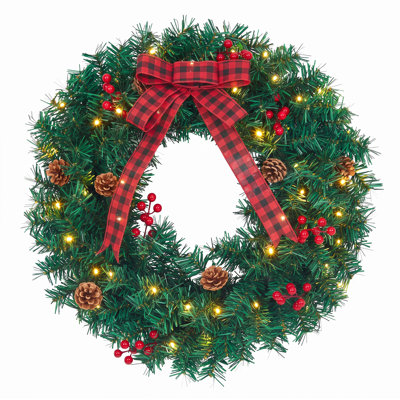 Couronne de Noël illuminée pour porte d'entrée - Lumières DEL blanc chaud, fonctionne sur piles - Nœud à carreaux, pommes de pin et baies rouges - PVC durable et réutilisable