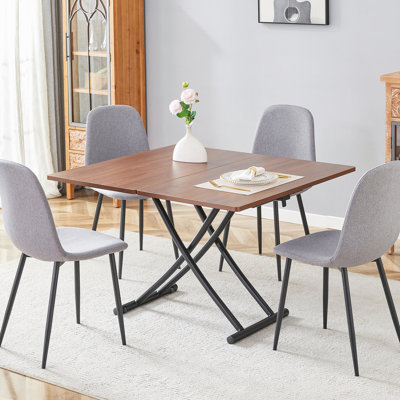 Table de salle à manger moderne minimaliste avec chaise de bureau texturée en noyer de 0,8 po d'épaisseur, pieds en métal noir, 4 sièges gris à haute résilience à hauteur ajustable et chaises en grain de bois