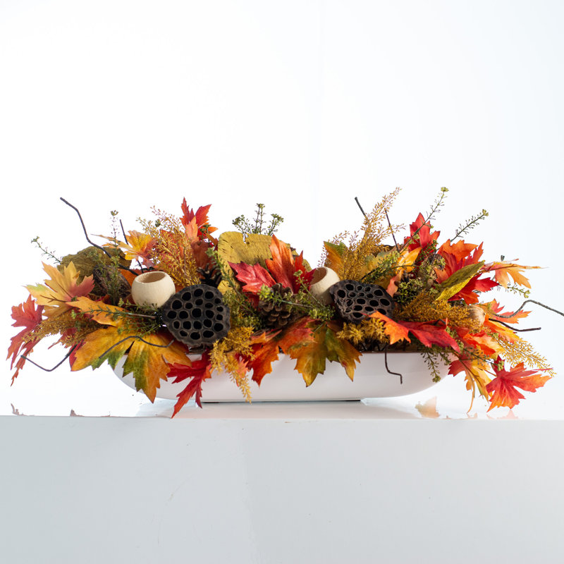 Arrangement floral mélangé dans un vase