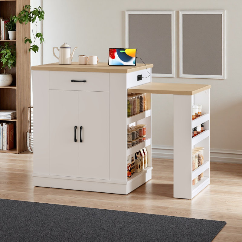 Console d'îlot extensible avec tiroirs, armoire à deux portes et tablettes ouvertes. Sert de table de salle à manger, barre de petit déjeuner temporaire