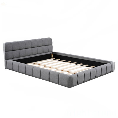 Grand lit plateforme tapissier avec tissu épais
