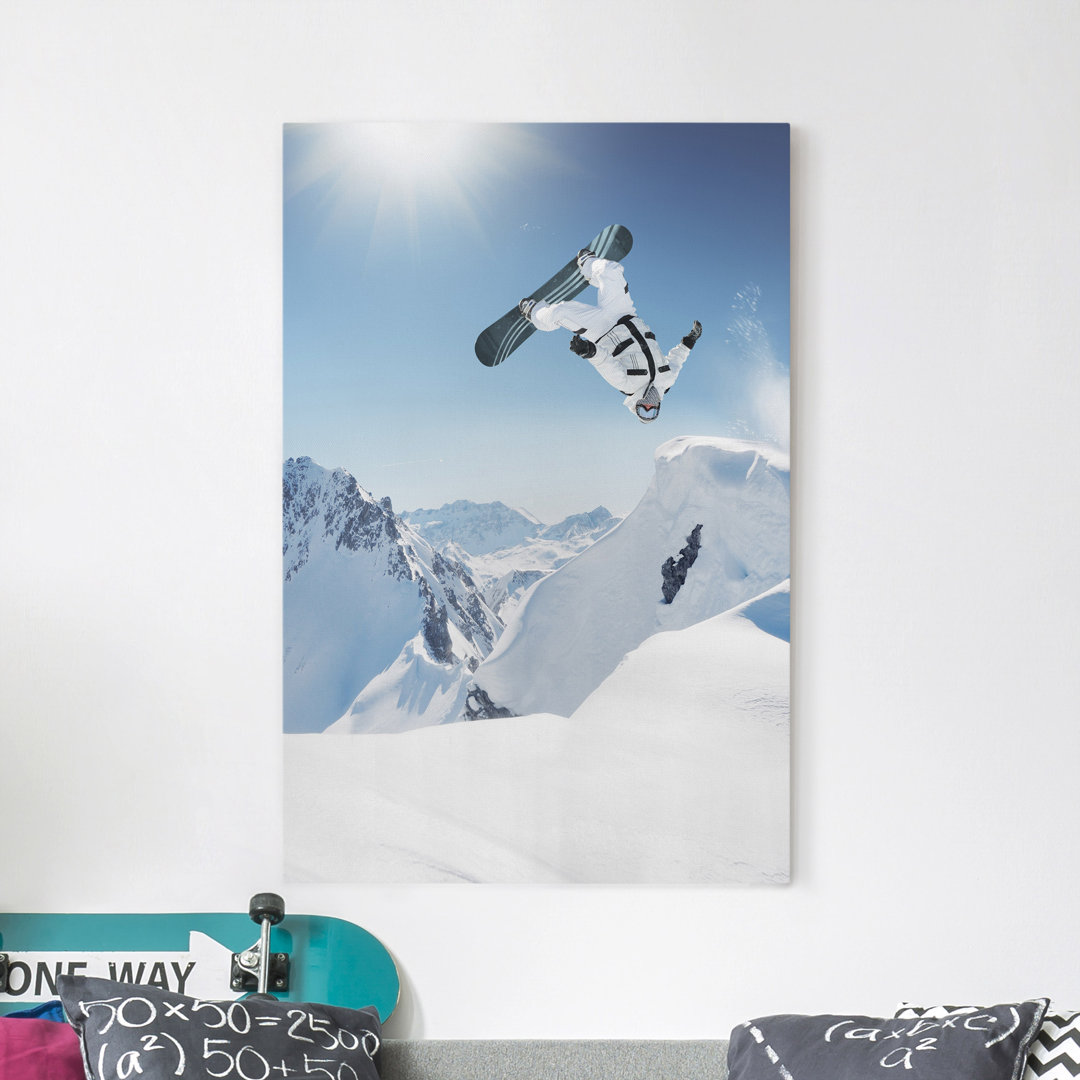 Leinwandbild Flying Snowboarder