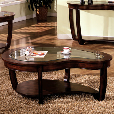 Brown Wood Tone Dark Cherry Coffee Table With Irregular Design And Open Storage Shape Tempered Glass Insert Top
