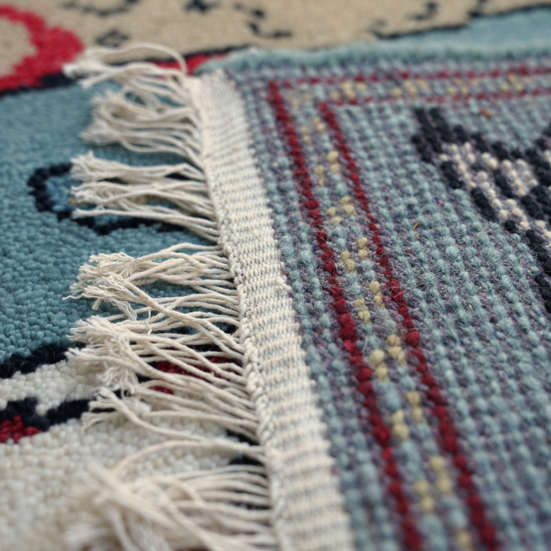 Selika Hand Woven Wool Area Rug