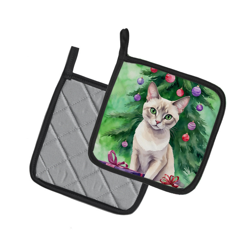 Paire de porte-pots en forme de chat lilas thaïlandais près de l'arbre de Noël