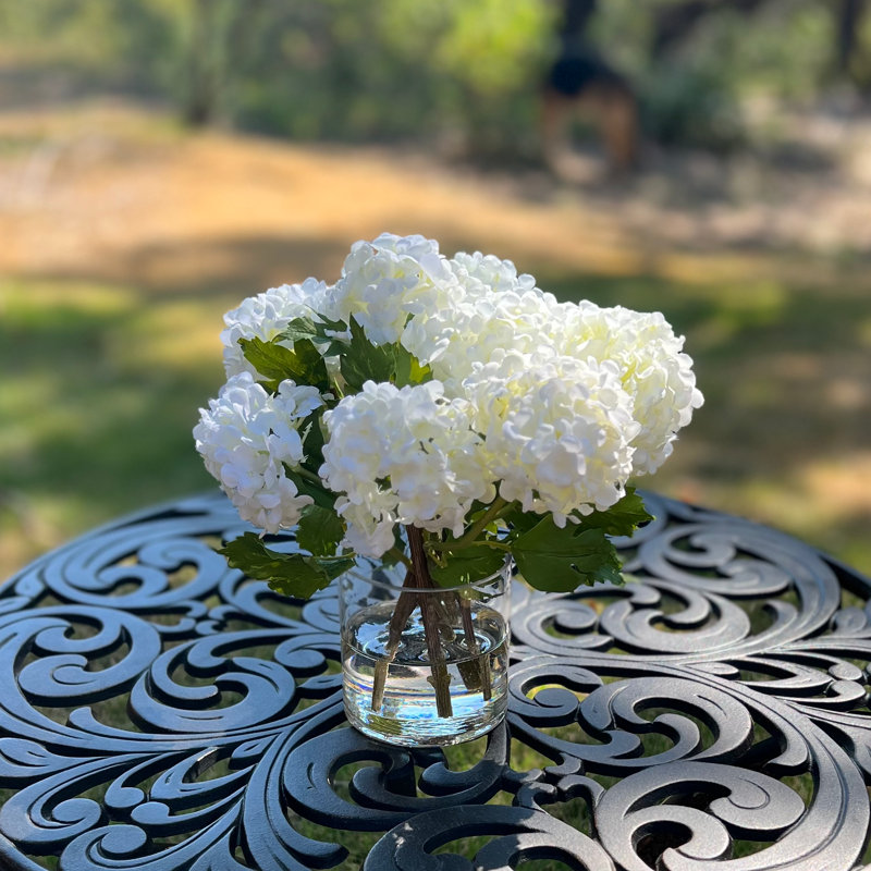 White hydrangeas arrangement in vase
