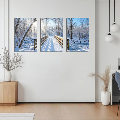 Ensemble de 3 tableaux sur toile tendue représentant un pont dans une forêt d'hiver