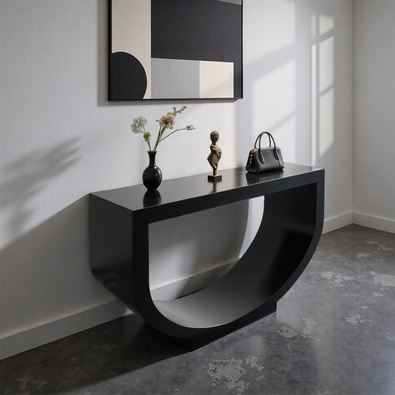 Table de présentation noire minimaliste courbée, H 27,56 po x l 47,24 po x P 15,75 po