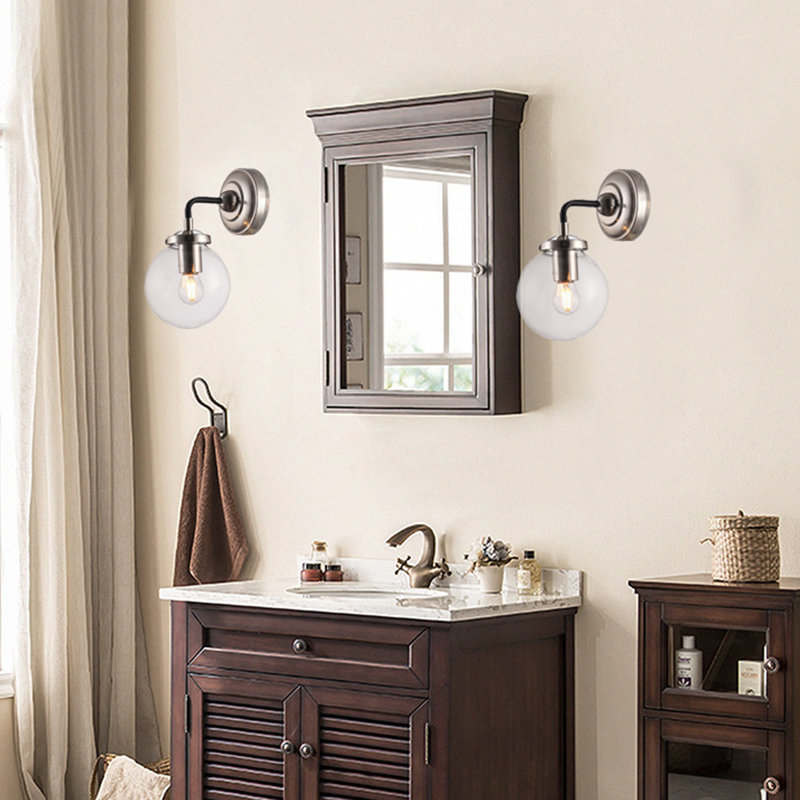 1-Light Shiny Nickel And Black Armed Sconce With Clear Glass Shade