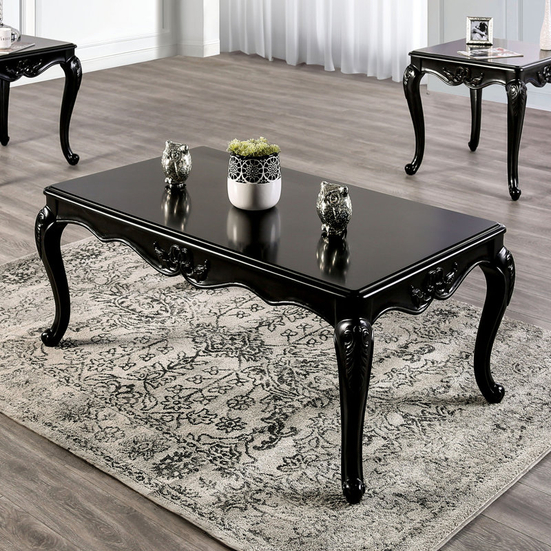 Table basse de style traditionnel avec pieds incurvés en bois massif